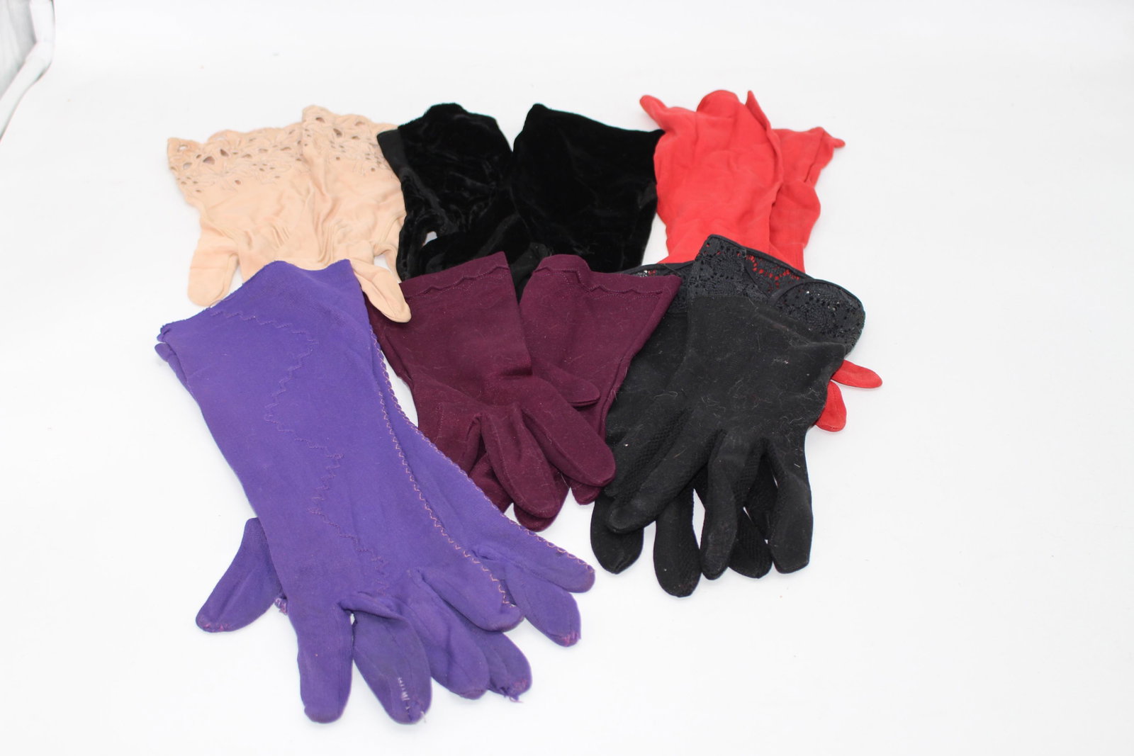 Lot of 6 Pair Vintage Gloves: velvet, peach pair & Black with eyelet, purple, red and maroon pair