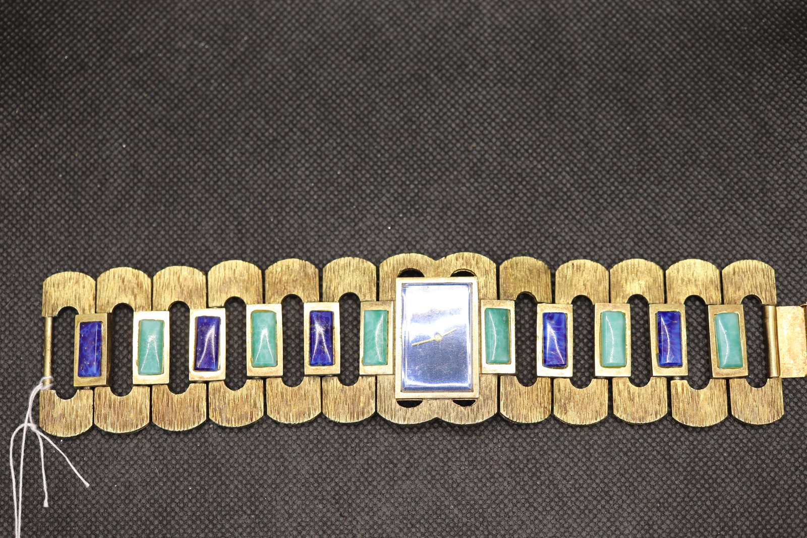 Vintage Ladies 17 Jewel Watch, Linked Band with Natural: gold tone links with inlay blue and green stones, 17 jewels, marked MJM, approx. 1 1/2 inches wide x 7 1/2