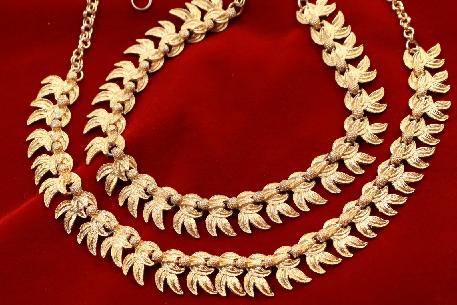 Pair of Vintage Gold Tone Necklace Chokers: Interesting pair of choker necklaces here. They appear to be the same necklace though one clasp is different from the other. They measure about 17" long and lay flat when worn.