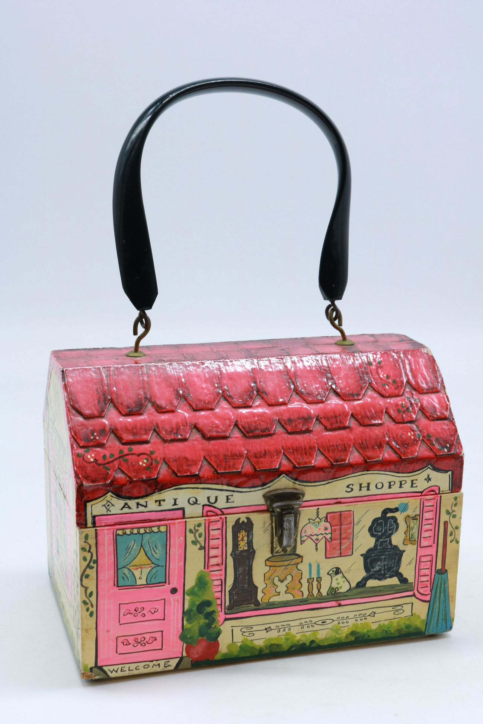 Vintage Handpainted Wood Antique Shoppe Cottage Purse: Such a little charmer here. The handpainting is lovely and primitive in style. Lining is avocado green felt. Nice twist in the handle. Measures 4.75" x 7.5" x 5.5" tall