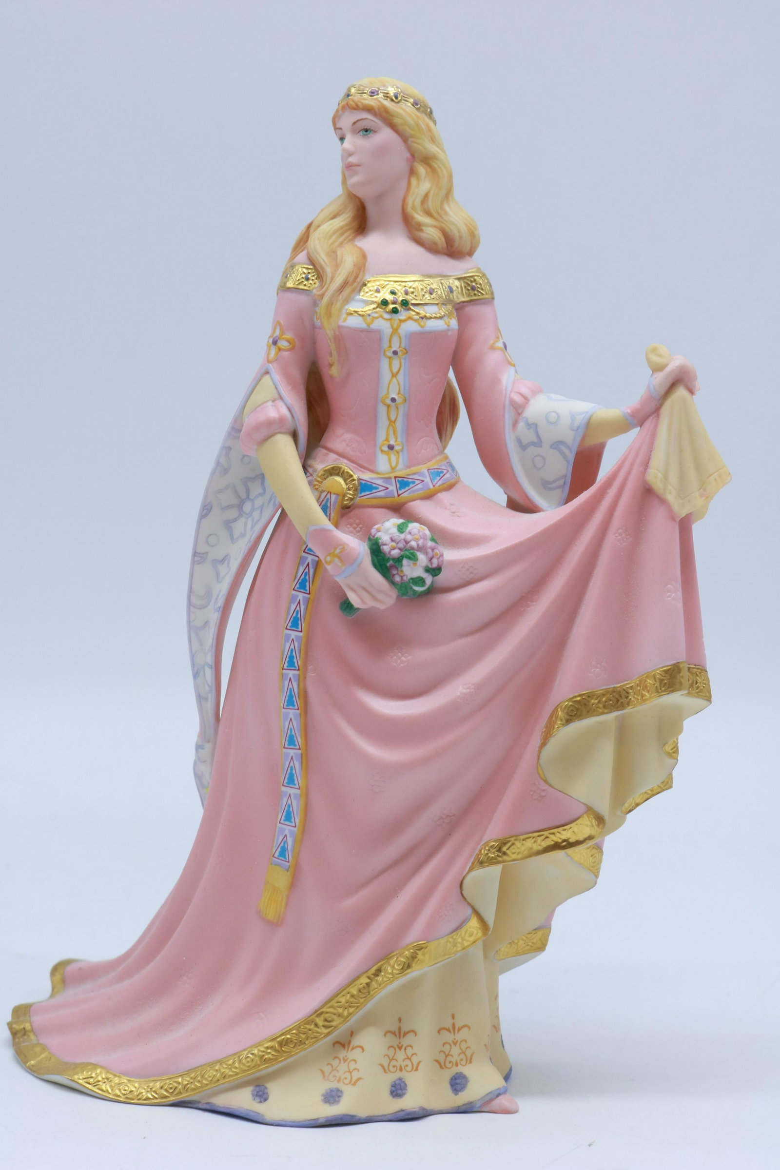 Lenox Figurine Guinevere The Legendary Princess 1990: Fine porcelain figurine. Note the tiny chip on the gold at the bottom back of her gown. Measures just over 9" tall.