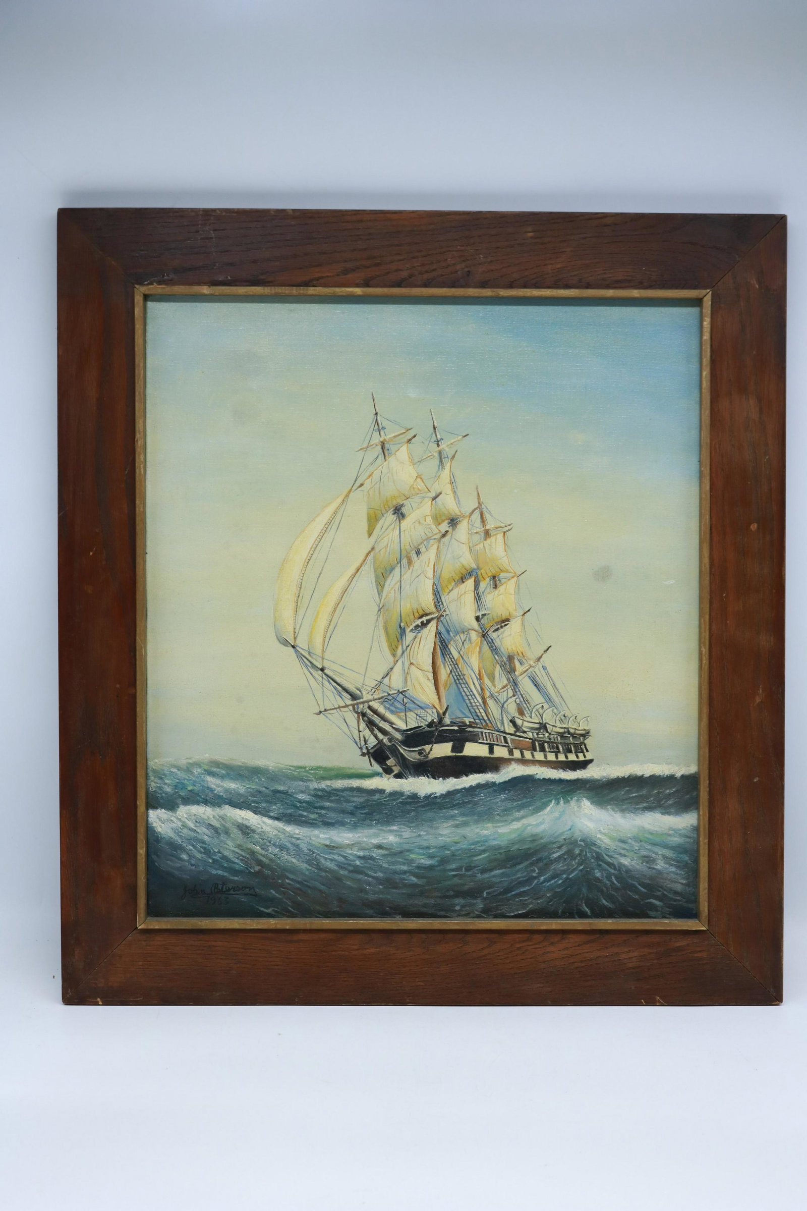 Vintage John Peterson Signed Oil on Canvas Painting in: Beautiful nautical scene with a ship being gently tossed in the sea. Signed and dated 1963. Frame is oak. Measures 20.5" x 22.5".