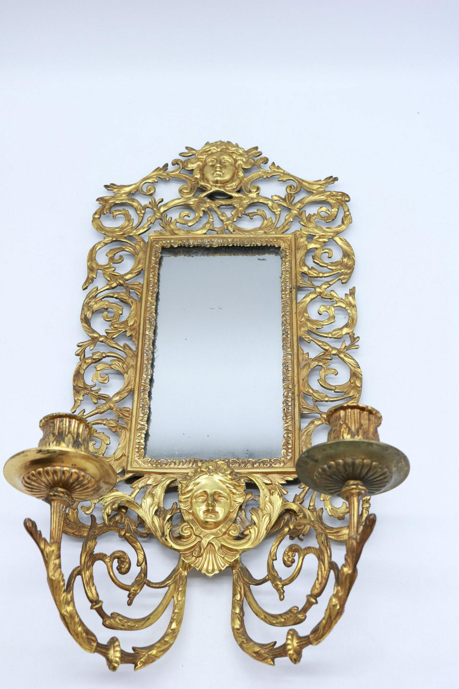 Antique Goddess Brass Hall Mirror with Candle Holders: Excellent overall condition on this piece and ready to hang. Measures 20" tall, 9" wide and projects from wall 5.25".