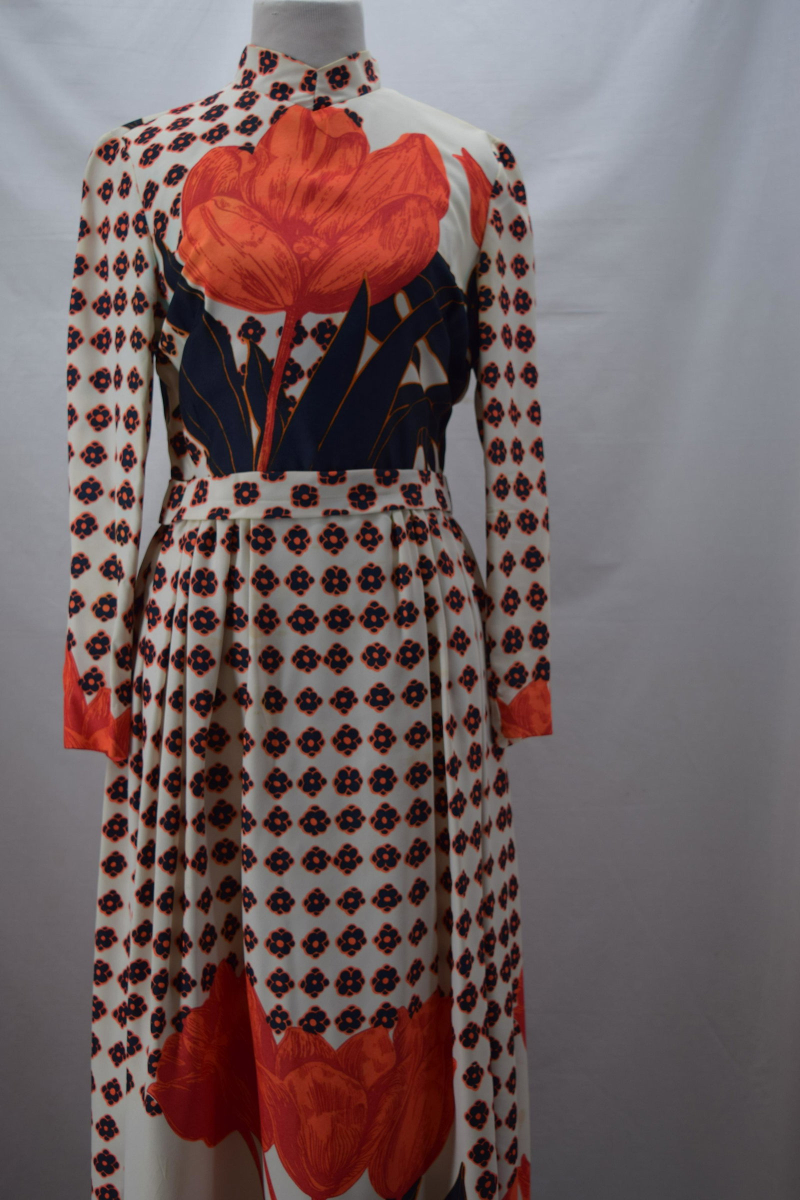 1960'S ORANGE AND NAVY MAXI DRESS: BUST 36 WAIST 28, Polyester crepe fabric, oversized floral motif. Underarm bleed.