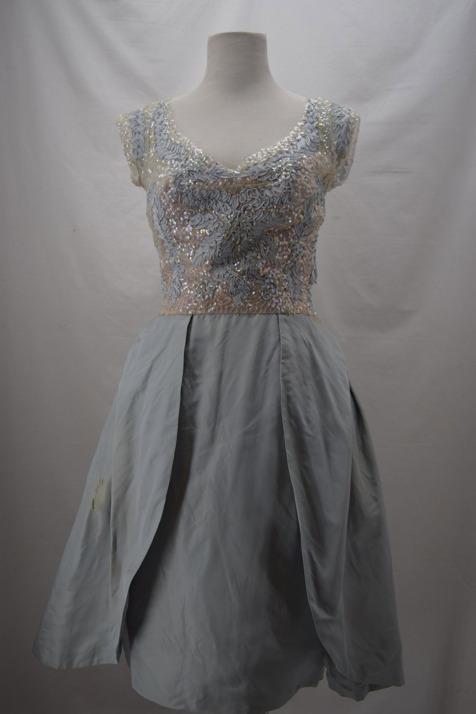 Vintage 1950's Party Dress with Sequin & Ribbon Bodice: Silk party dress with soutache ribbon and sequin bodice, sleeveless V-neck with petal skirt, metal zipper up back, under tulle at hips for fullness, missing hooks that attach petals at front of skirt,