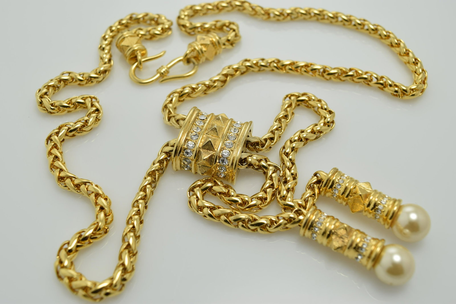 Vintage SMB Slide Style Tassel Necklace with: gold tone thick chain tassels with large pearl bead and rhinestones inlay, slide style approx. 26 1/2 long with 7 inch tassel drop