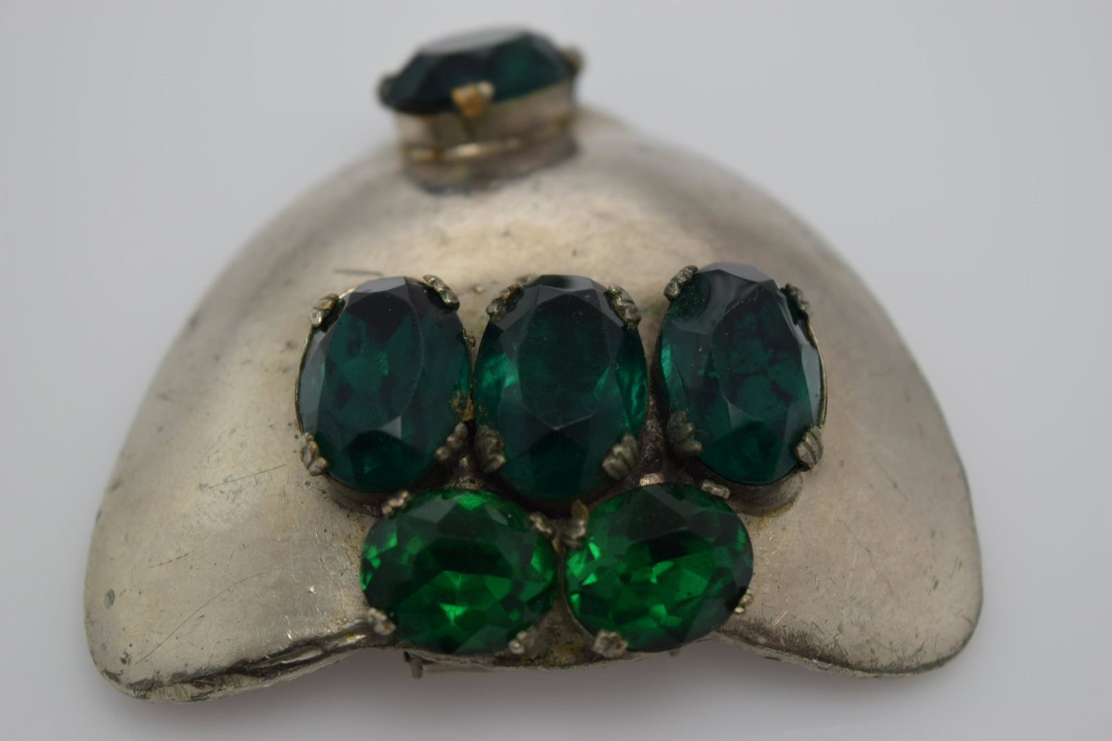 Large Art Nouveau Dress Clip with Faceted Green Stones: silver tone buckle with large green faceted stones, approx. 2 x 2 1/4