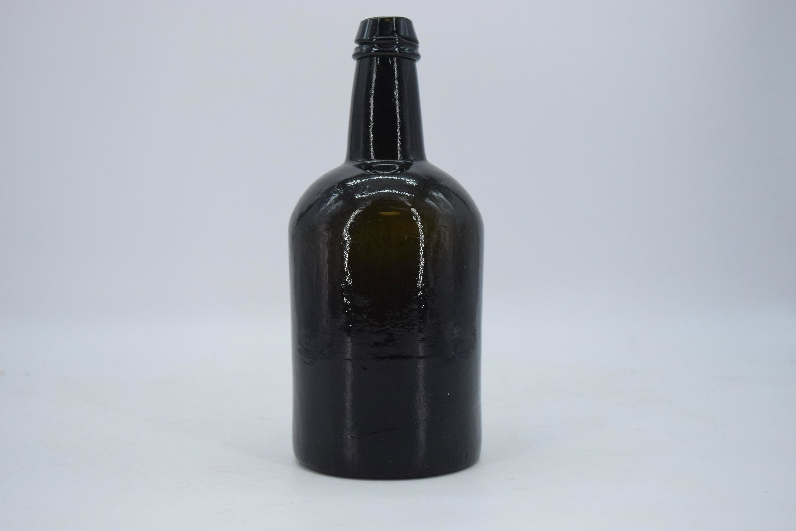 Antique H Ricketts Glass Works Bristol Black Glass: hand blown Black glass olive green glass bottle, embossed signature on base, approx. 9 inches tall