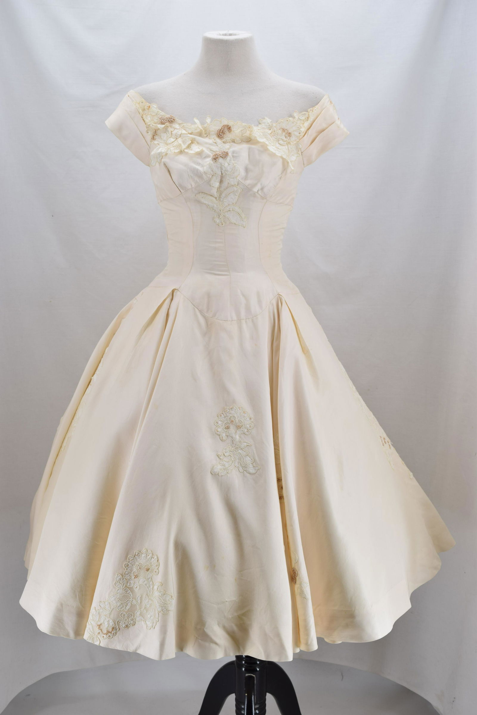 Vintage 1950's Silk Ivory Applique & Beading: fit and flare princess dress, sleeveless, wide band at fitted waist, full flared circle skirt, has inner should hanger stain from storage with slight outside stain, other wise good condition