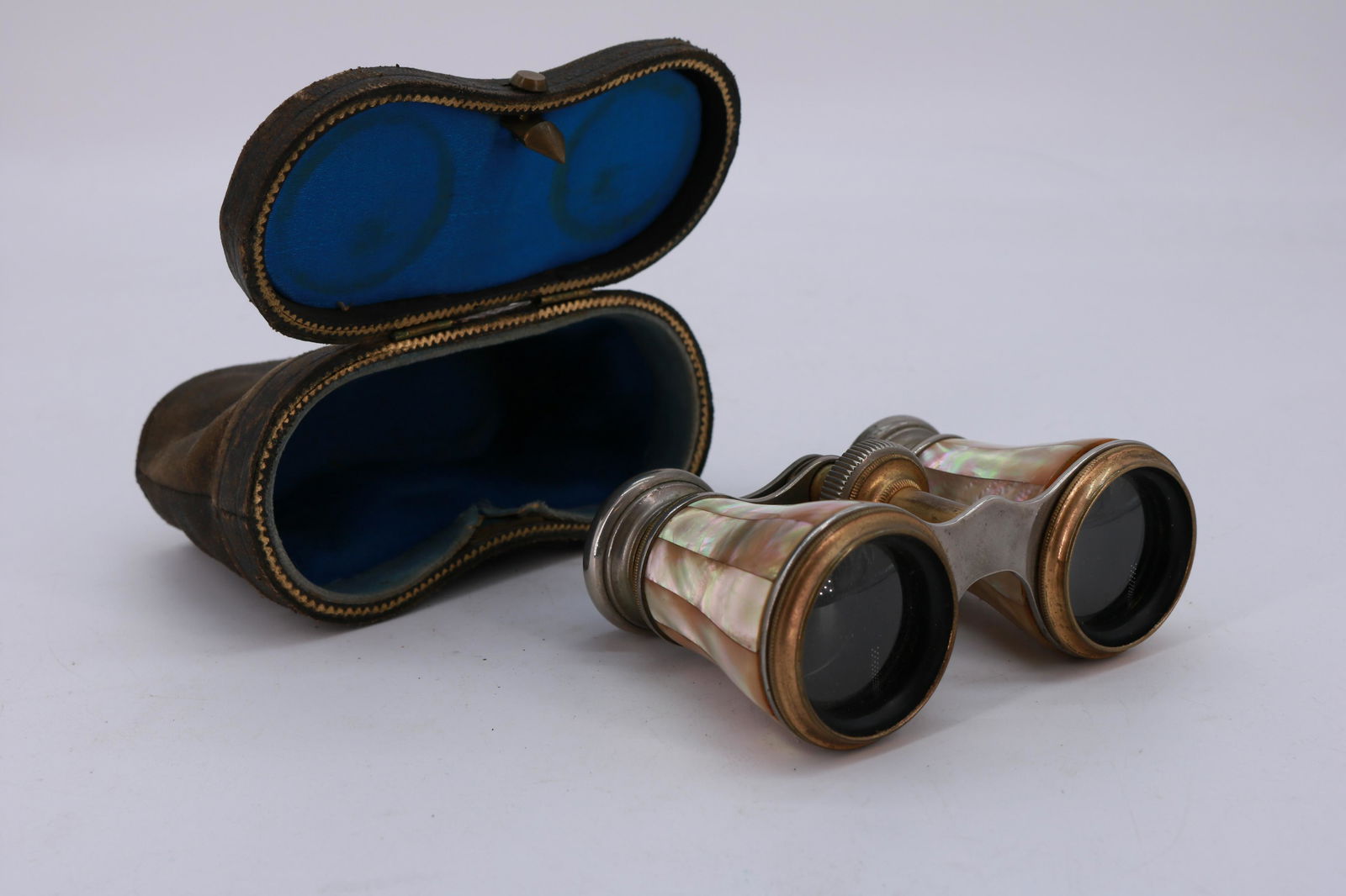 Mignon Paris, Antique Mother of Pearl Opera Glasses: mother of pearl in great condition, one lens is loose, has original leather case