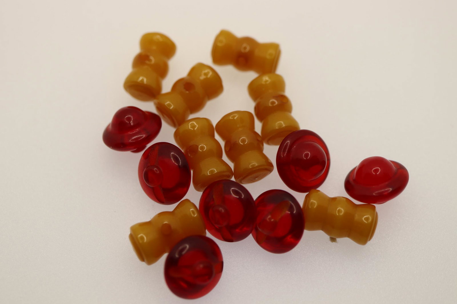 Lot of 1940's Bakelite Buttons, 15 pieces: set of 9 red, set of 8 butterscotch, 1/2 inch wide