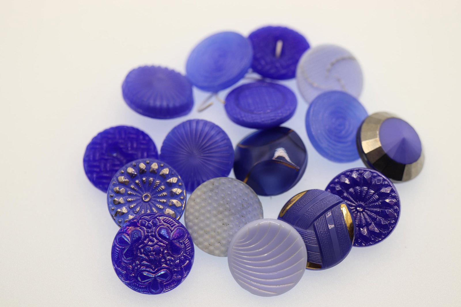 Lot of 16 Czechoslovakian Glass Buttons, Shades of Blue: 16 different designs, 3/4 inch