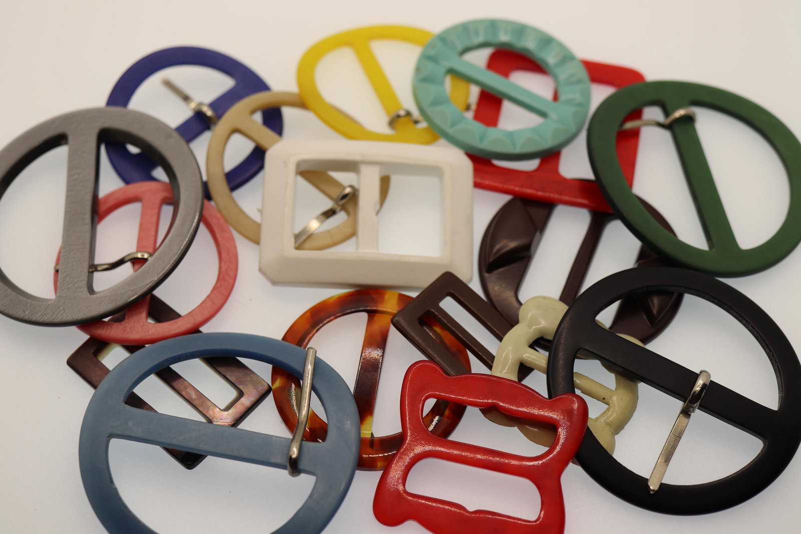 Lot of 17 Vintage Belt Buckles: plastic, mother of pearl, celluloid and other, 1920-1950's