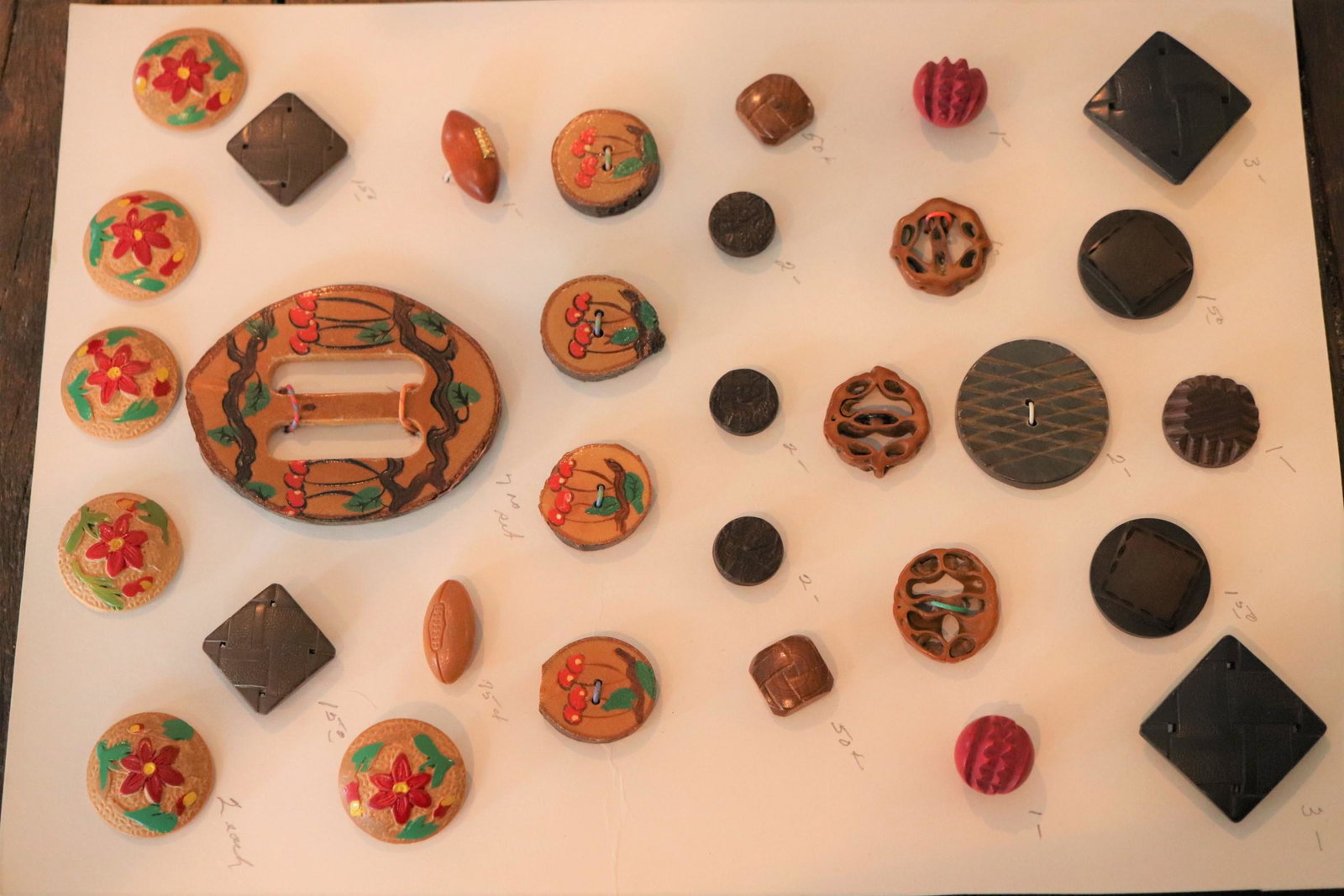 Lot of Vintage Carved & Hand Painted Wood Buttons &: wood carved and hand painted button and buckle set with cherries set of 6 carved red flower buttons, 2 foot balls one is wood the other plastic, and others, approx. 5/8 to 1 3/8, buckle 3 x 2 1/4