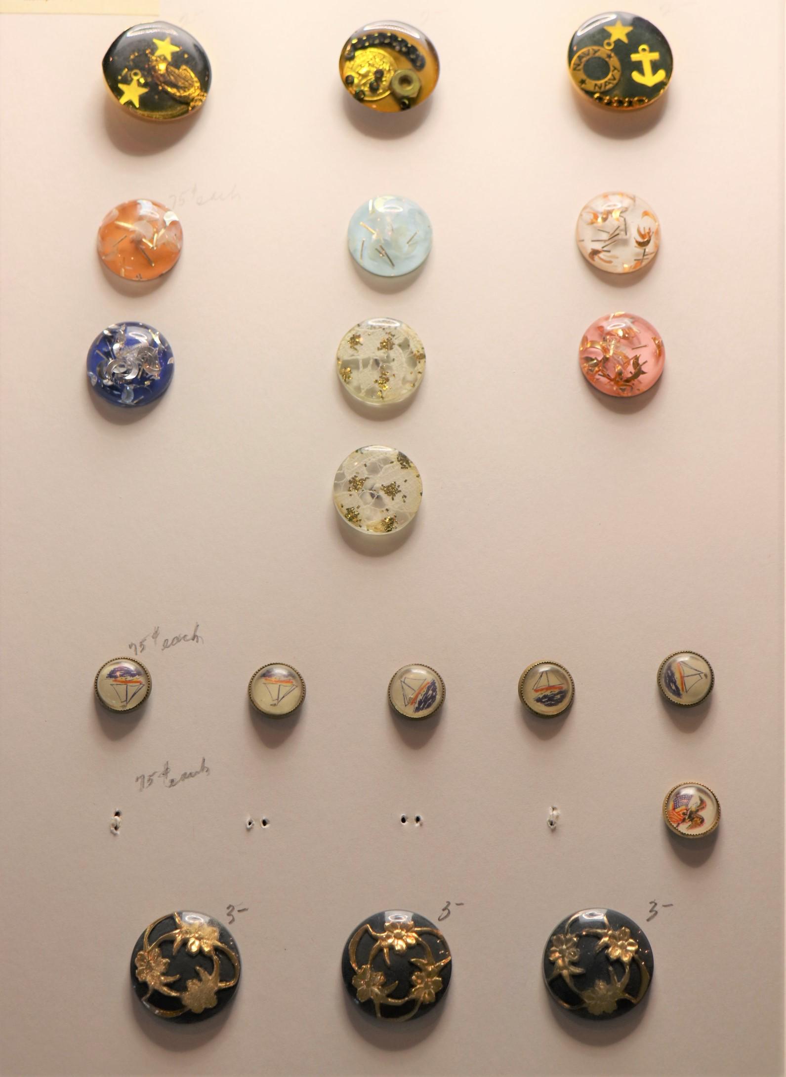 Lot of 19 Vintage & Antique Paperweight Style Buttons: 3 Lucite with metal ship, navy, coin, 7 Lucite with metal fleck, set of 6 with litho sail ship one with eagle, 3 black Lucite with gold flowers, approx. 1/2 to 1 1/8