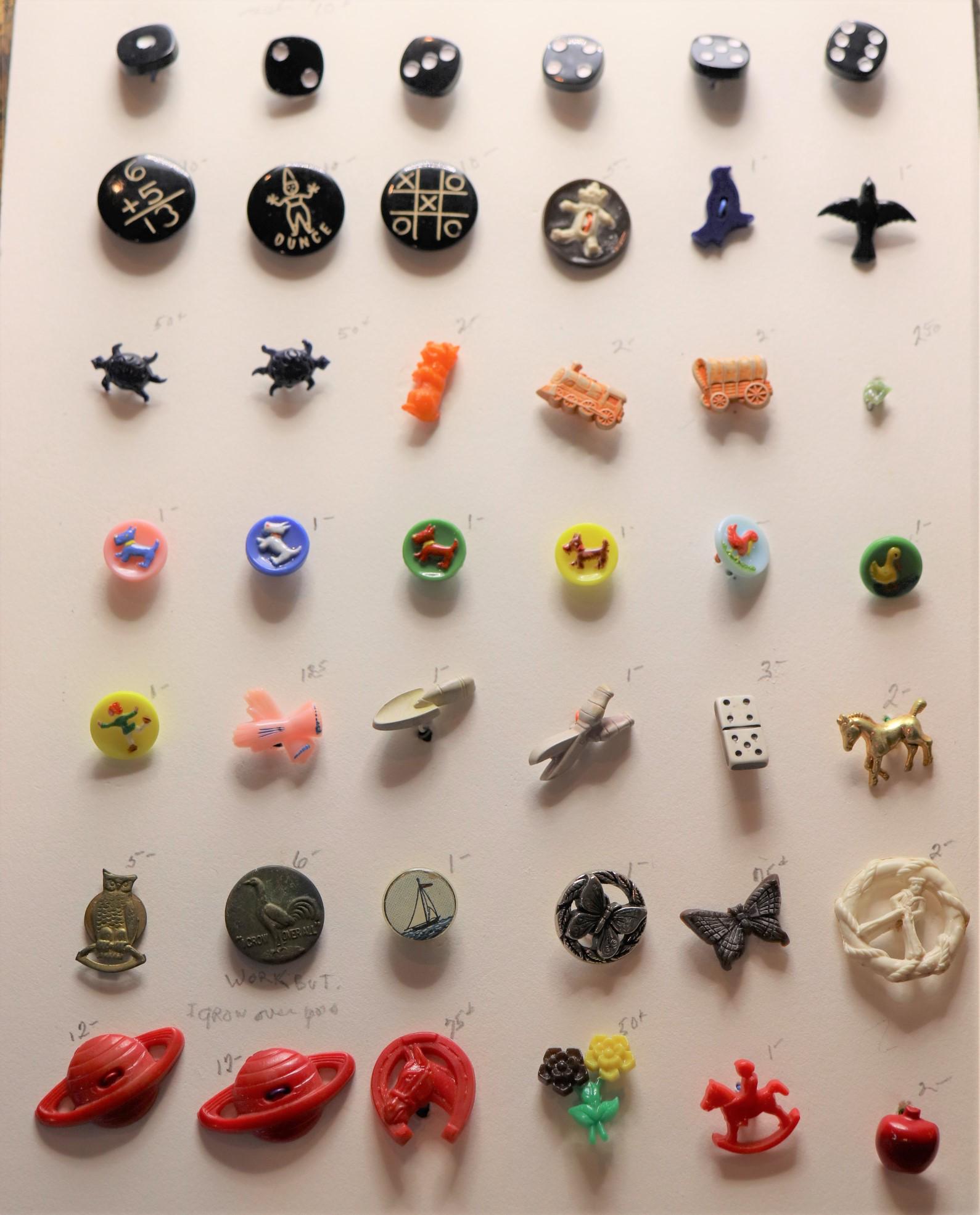 Lot of 41 Vintage 1930-50's Novelty Buttons: Metal work button with rooster "I grow Overall" , metal owl, set of 6 plastic dice, carved addition, ounce, and tic-tac tow, sailor or cracker jack man, dogs, birds, train, wagon, possible Bakelite pl