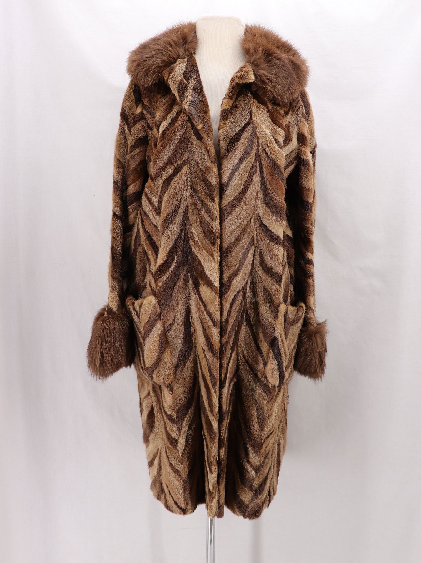 Vintage 1960's BILL BLASS Stripped Mink Fur Coat: long sleeves with long fur cuffs and collar, button front only one button out of five is in pocket, fully lined, large front pockets, great fur stripe design, bust 38, waist 38, two repairable tears o