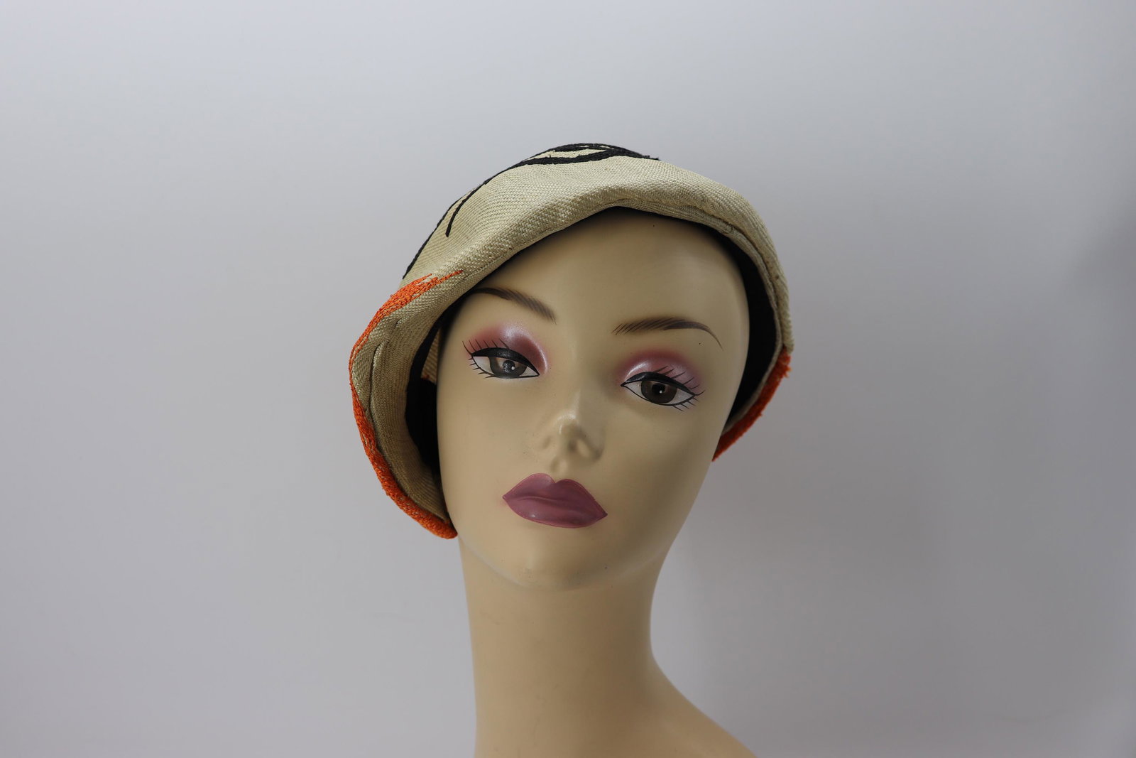 Vintage 1940's Don Marshall Embroidered Hat: woven wicker with orange and black embroidered stitching, sits to one side, nice condition