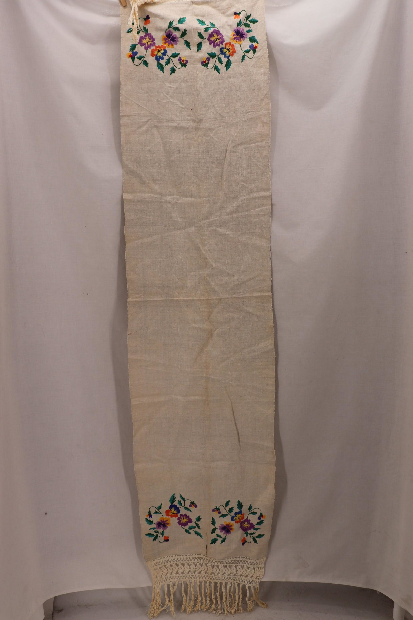 Vintage Hand Embroidered Pansy Flowers Table Runner: approx. 66 inches long, nice crochet and fringe 9 inches long, good condition