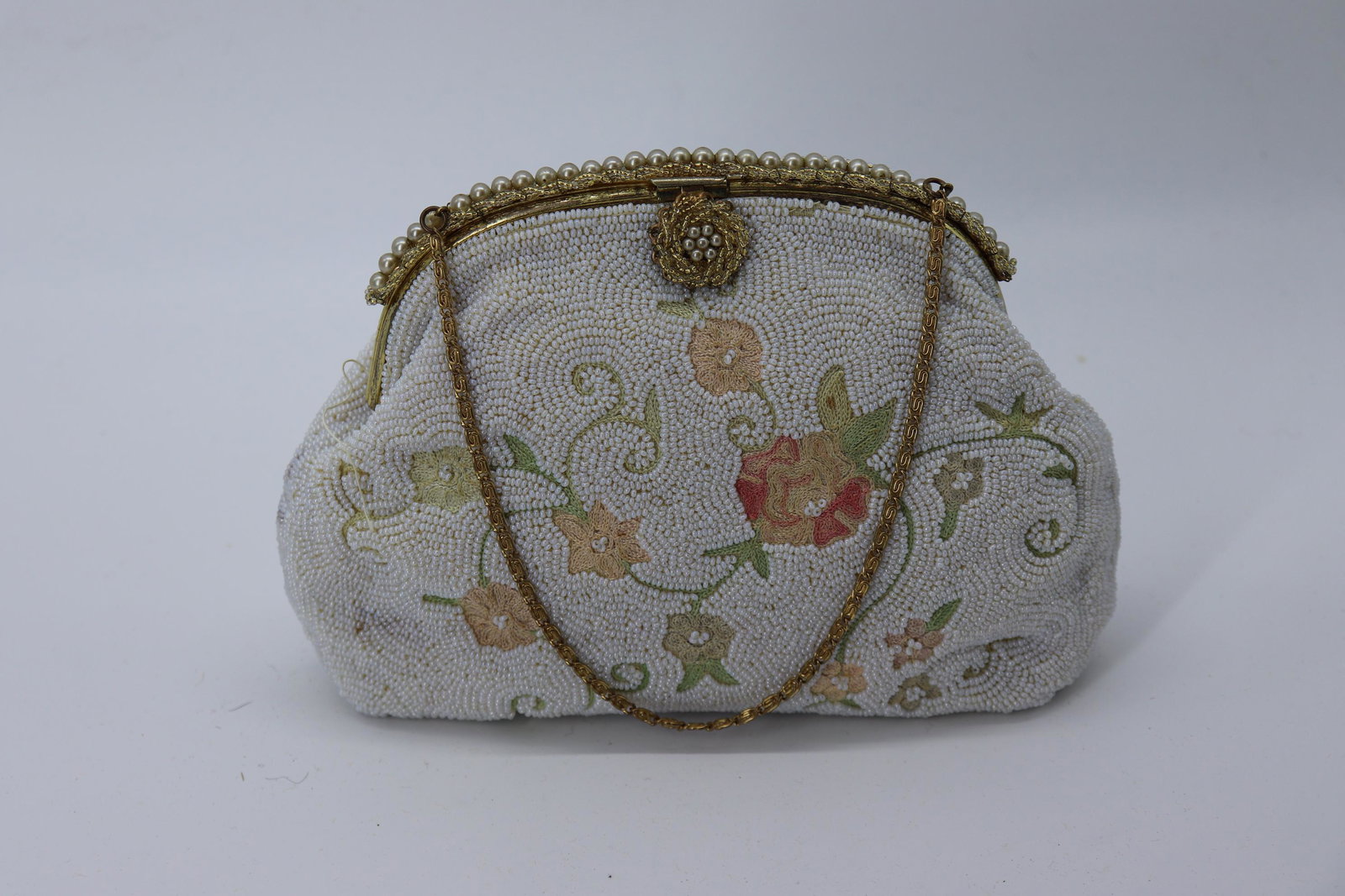 Vintage 1930's Belgium Beaded Purse: white fulling beaded purse with floral embroidery, gold arm/wrist chain, beaded frame with clasp, inside with only one small stain,