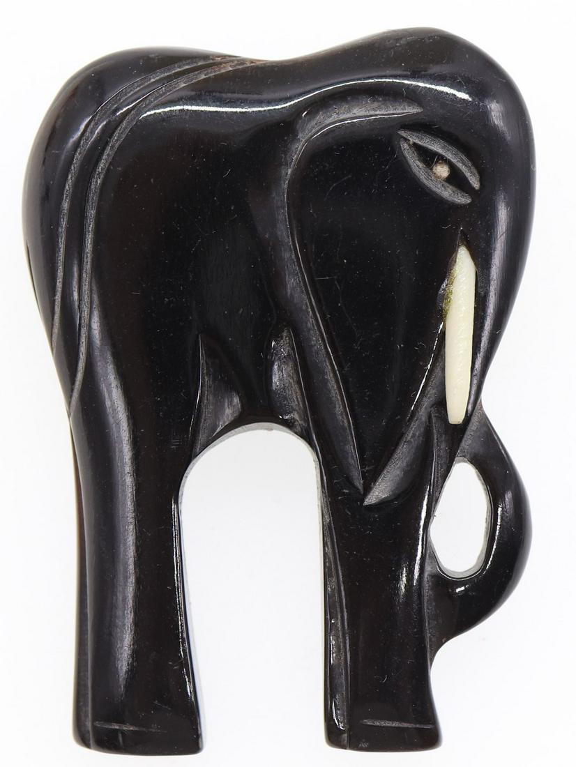 Vintage 1950's Black Bakelite Elephant Brooch with Bone: approx. 2 1/8 inches tall, bone tusk and black carved Bakelite