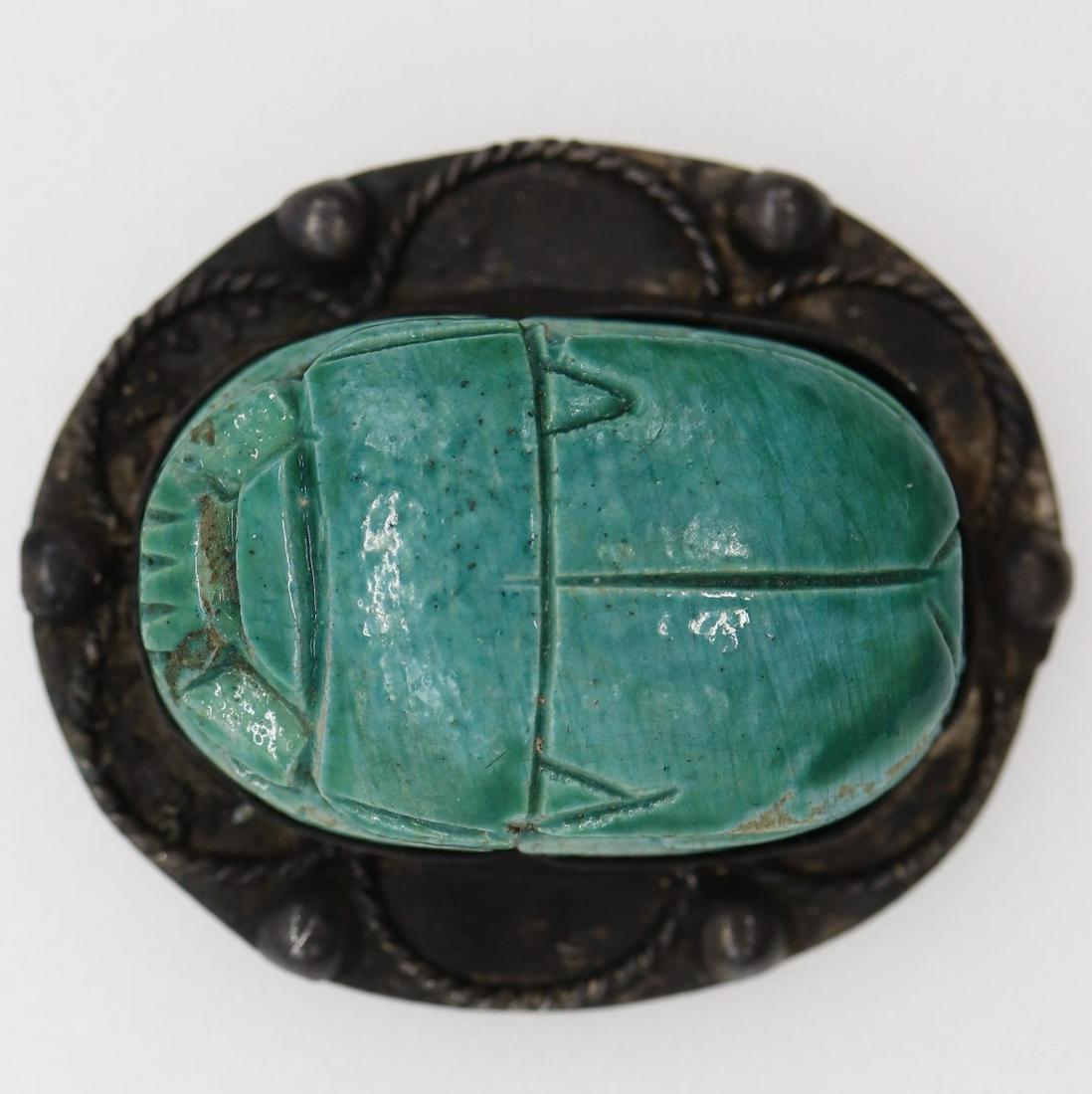 Vintage Scarab Brooch: large green scarab brooch with markings on back