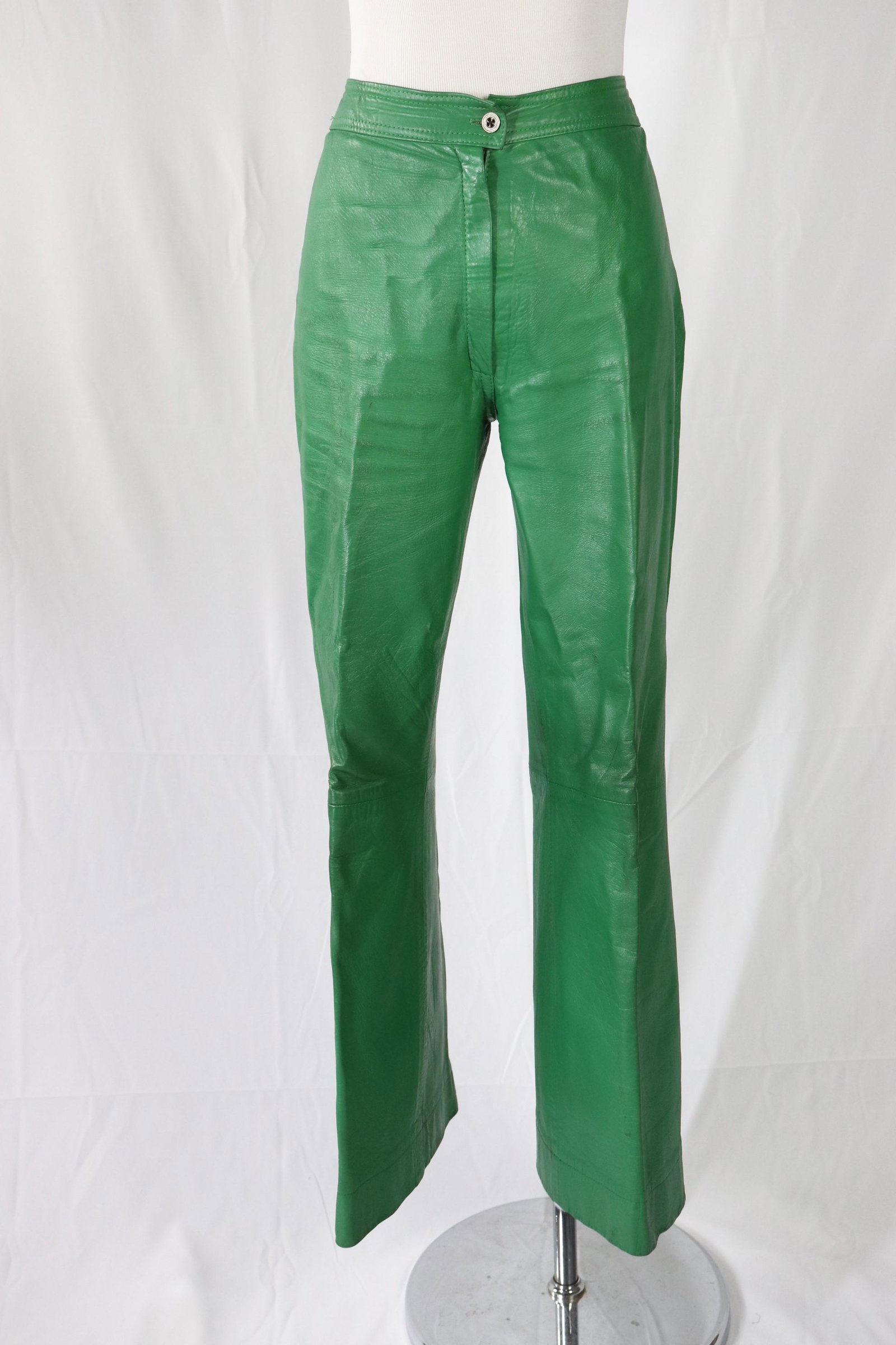 Vintage 1970's Green Leather Ladies Flared Pants: Made in France Leather Trapping for Bloomingdales, high waist, slightly flared leg, needs some cleaning, approx. 28 waist, 38 hip, 27 inseam, marked size 12