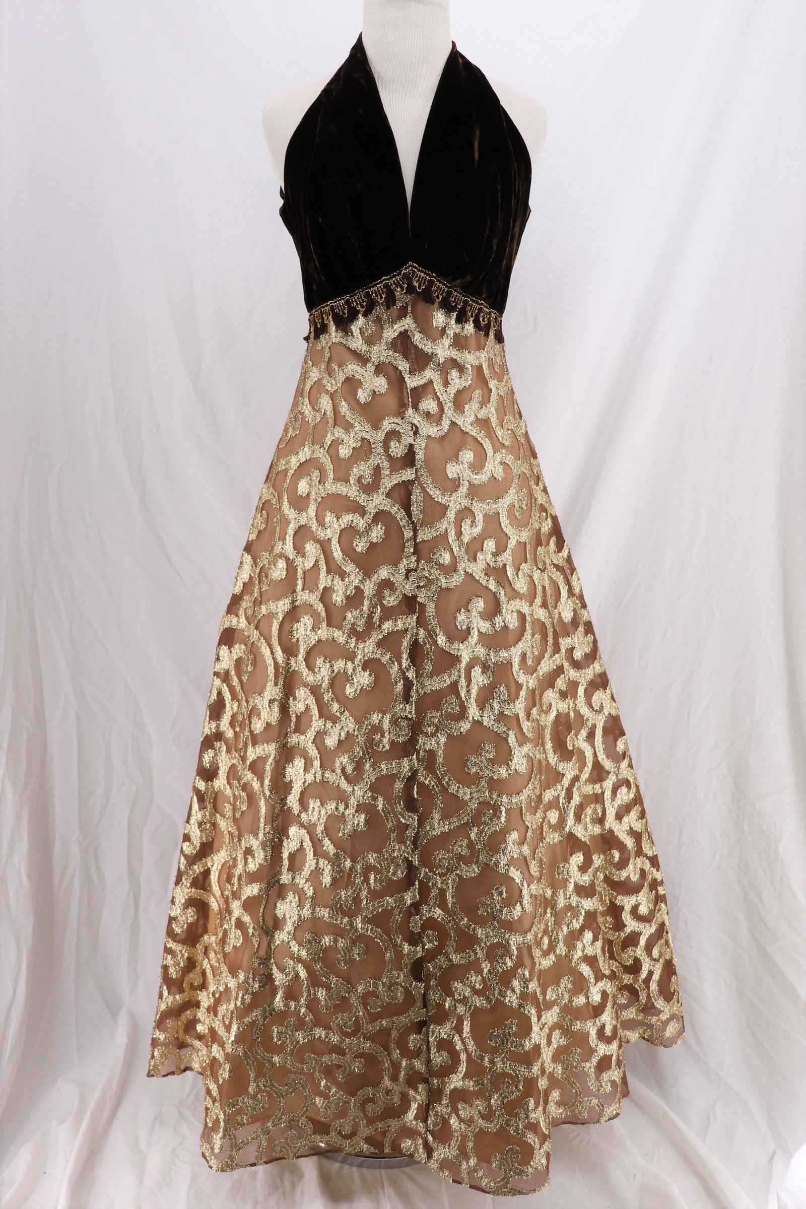 Vintage 1960's Velvet Halter Dress with Gold Tinsel: velvet halter top, empire waist with chiffon tinsel design flared skirt, back metal zipper, fringe at waist, fully lined, good condition, approx. 35/36 bust, 28 at high waist