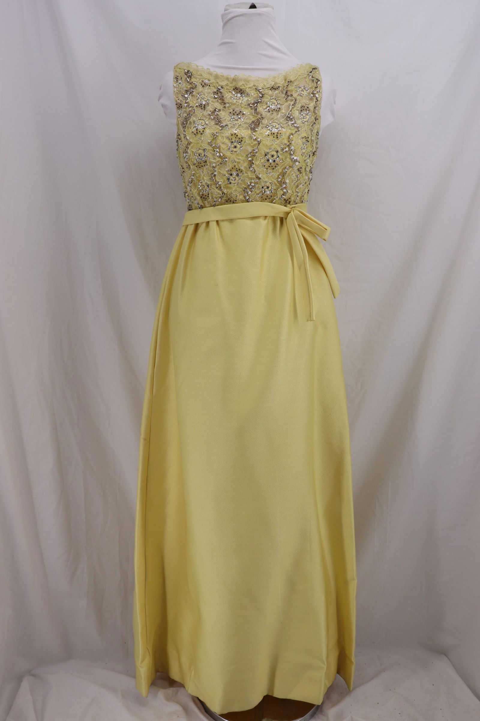 Vintage 1960's ELENOR SIMMONS for MALCOLM STARR Sequin: Sleeveless, bateau neck, ruffled net bodice with sequin hearts and beads, gathered high waist full length skirt attached bow belt, side slit pockets, back metal zipper and eye hooks, Approx.; 34 bust,