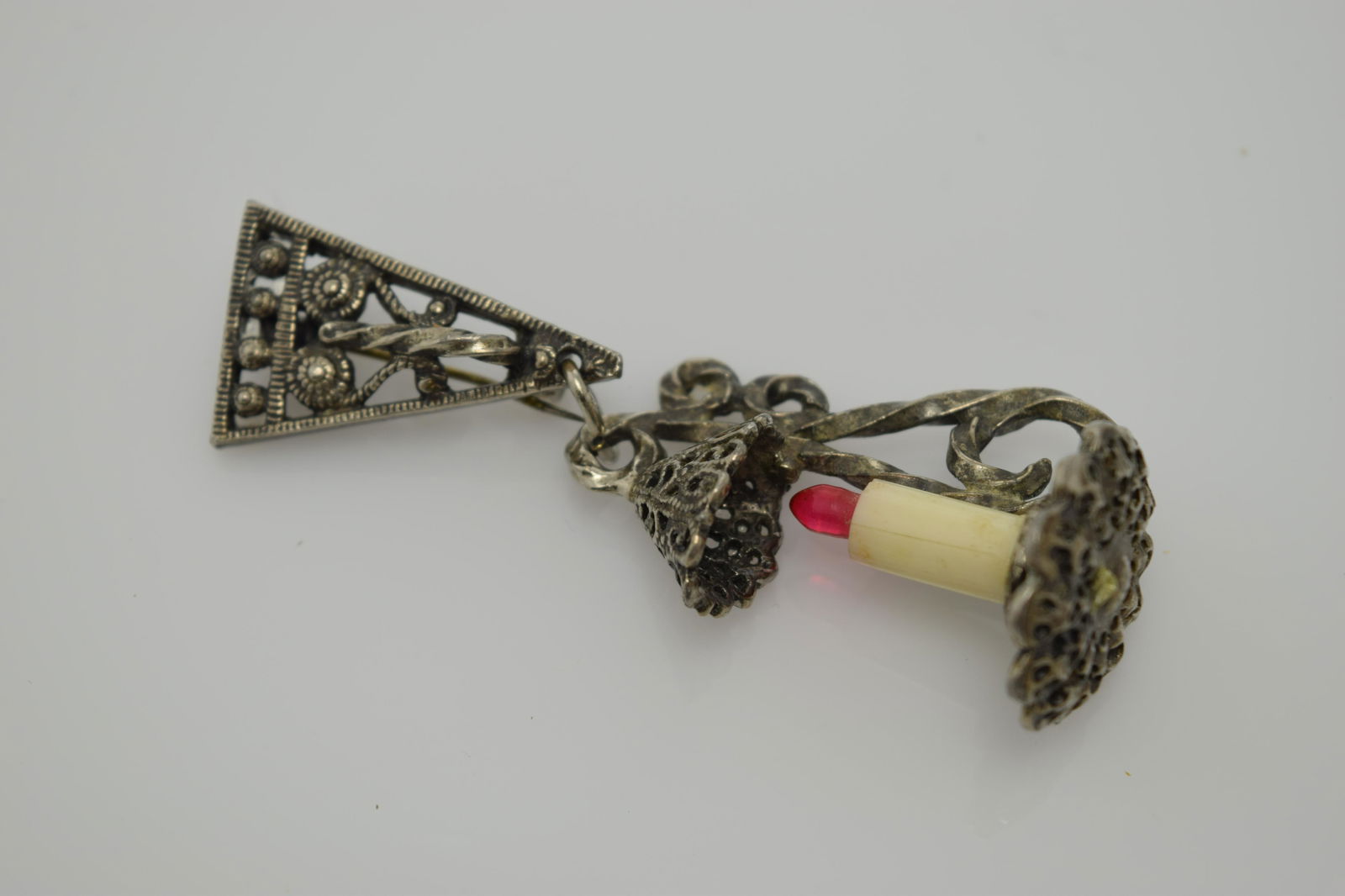 A vintage lantern with a candle for light pin. (1 of 3)