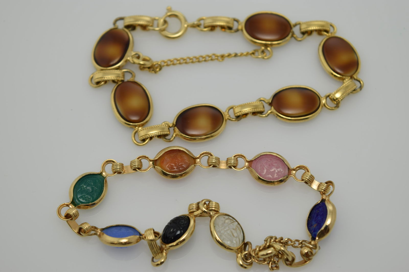 A lot of two bracelets including one scarab bracelet. (1 of 2)