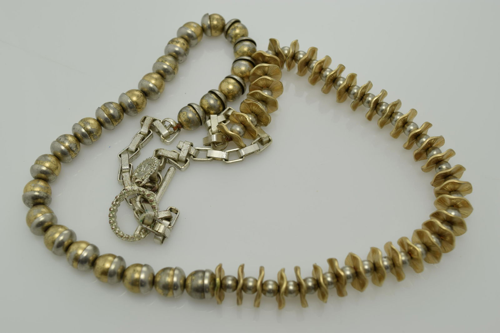 A funky designer necklace with maker's hang tag and (1 of 2)