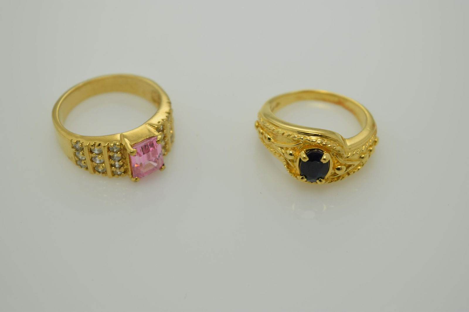 A lot of two gold over sterling rings. (1 of 2)