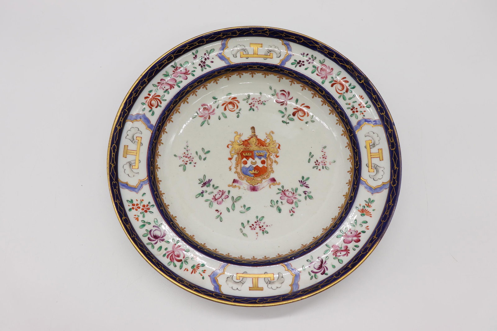 Antique French Armorial Porcelain Bowl, Signed: small chip on top rim that was repaired, flow blue with hand painting & gold trim, signed and X mark on bottom, approx. 9 3/4 across