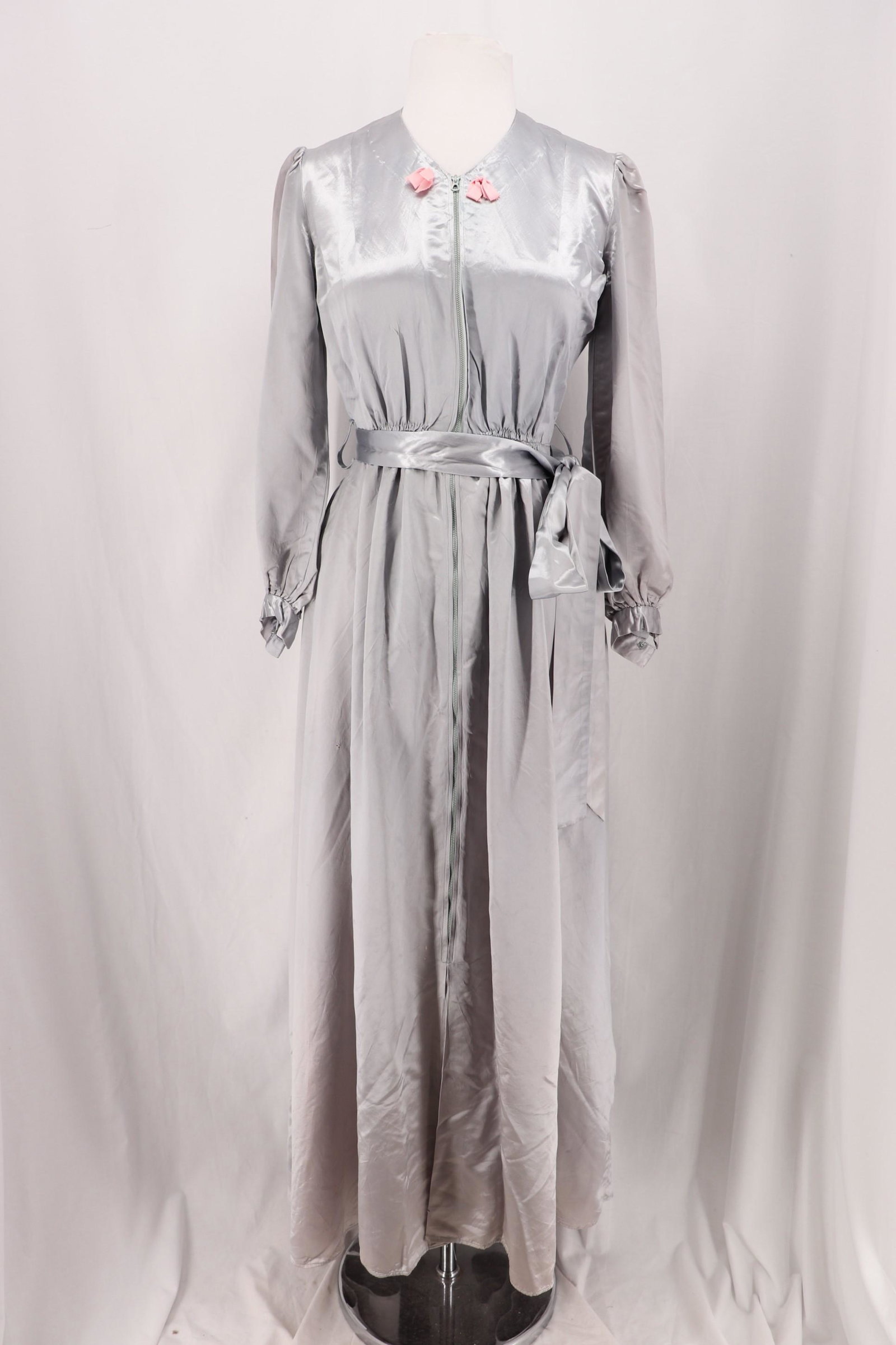 Vintage 1940's Satin Dressing Gown/Robe: long sleeves with gather at shoulders and cuffs, snaps at cuffs, scoop neck, zippers down the front with metal zipper, has smocking at waist with tie belt, approx. 36 bust, 25 waist, a couple pin hole