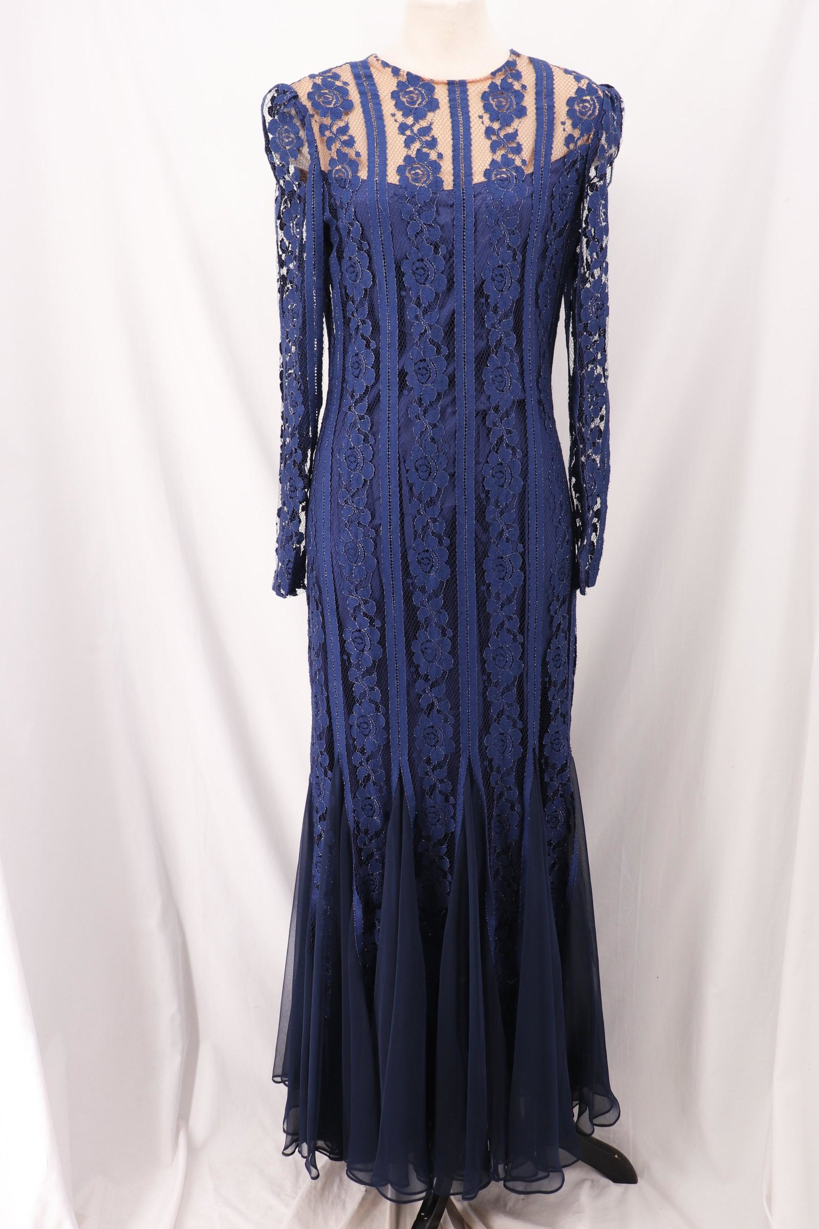 Vintage 1970/80's Pat Saunders Richelene Blue Lace Gown: long sheer blue lace sleeves, round neck, nude color top with blue lace over full length blue lace skirt with lace and chiffon mermaid bottom, back zipper, approx. 36 bust, 32 waist, attached under sl