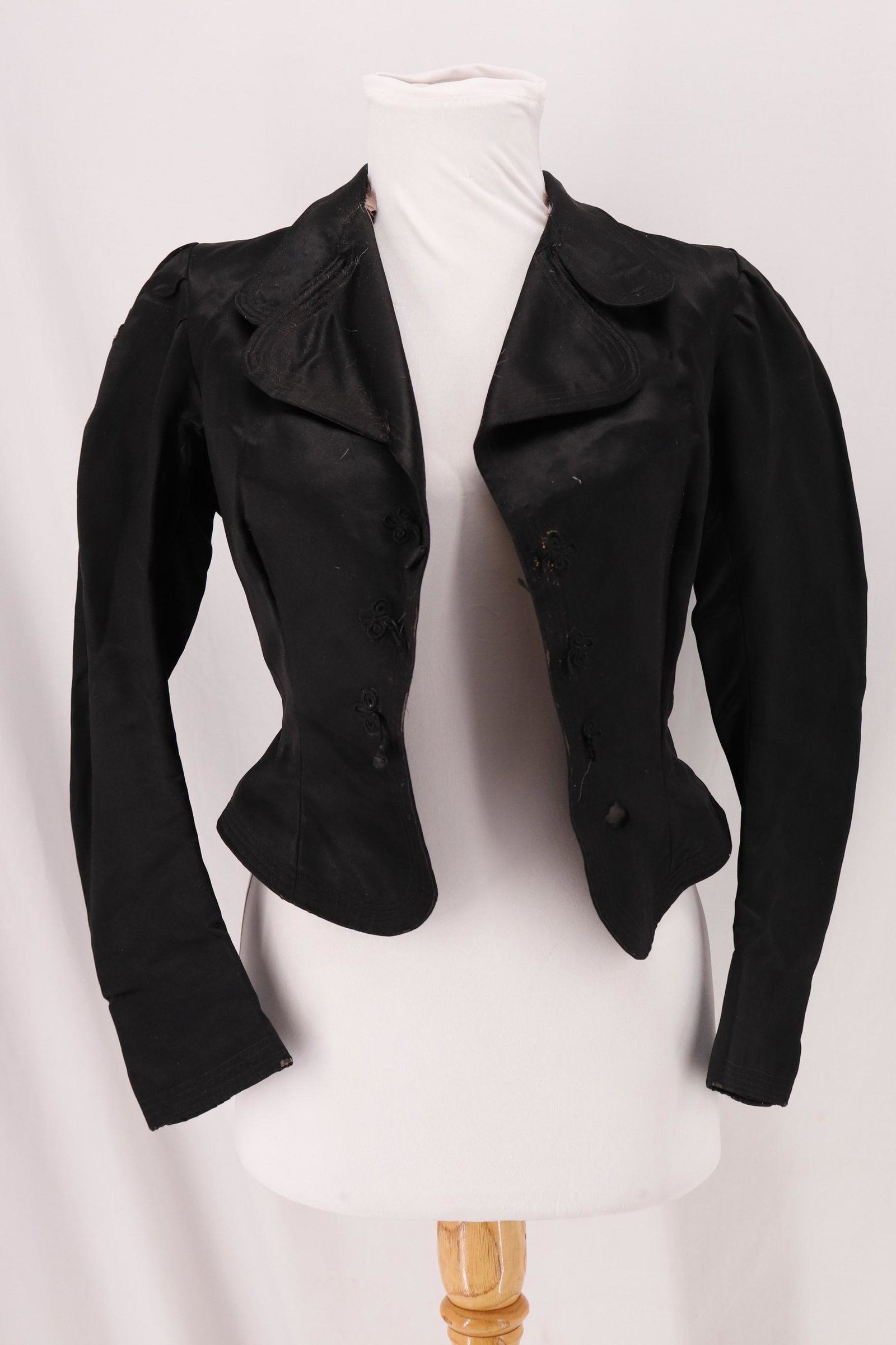 Vintage Victorian Ladies Black Satin Waist Coat: long sleeves with quilted cuffs, quilted collar, frog closures in front, but are damaged, quilted edging, approx. 30 bust, 24 waist, great design piece, see photo's for damage and fray