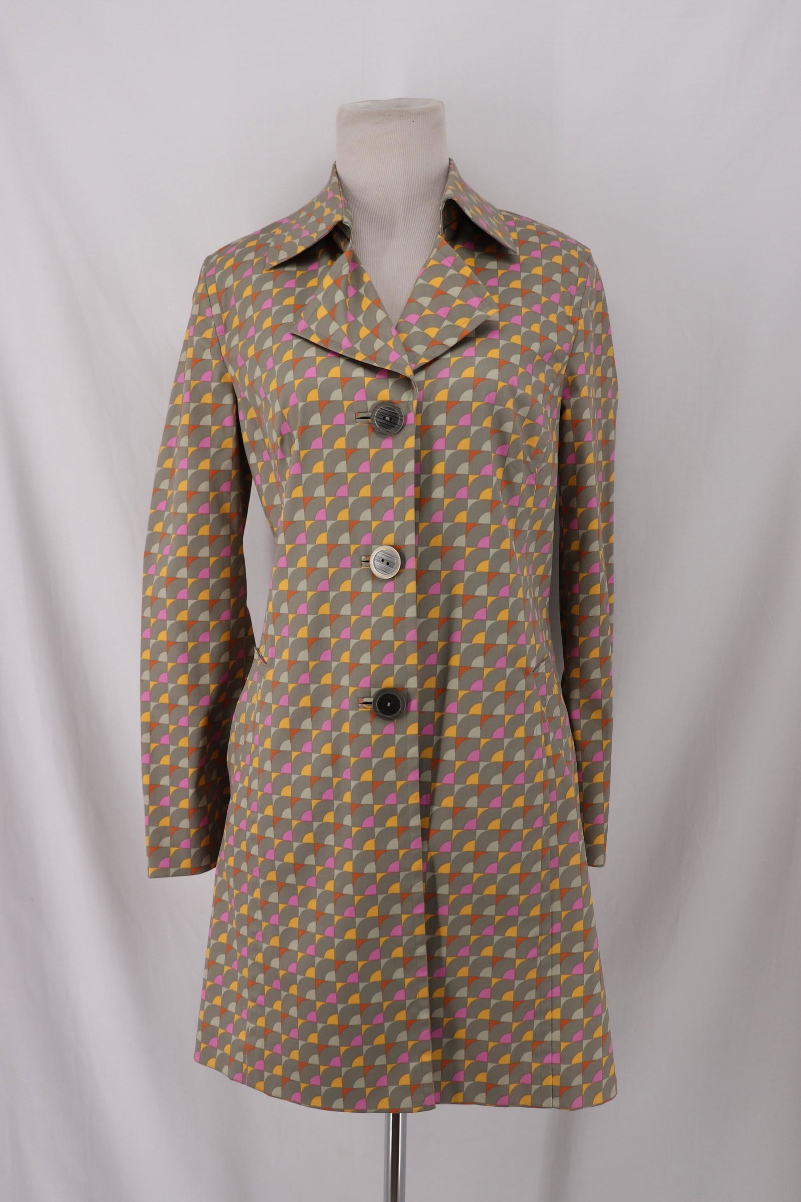 Vintage Sigrid Olsen 1990's Raincoat: long sleeves, traditional quilted collar, lower front angled pockets with quilted trim, 3 button front, geometric print, Approx. 38" Bust, 34" Waist, good condition