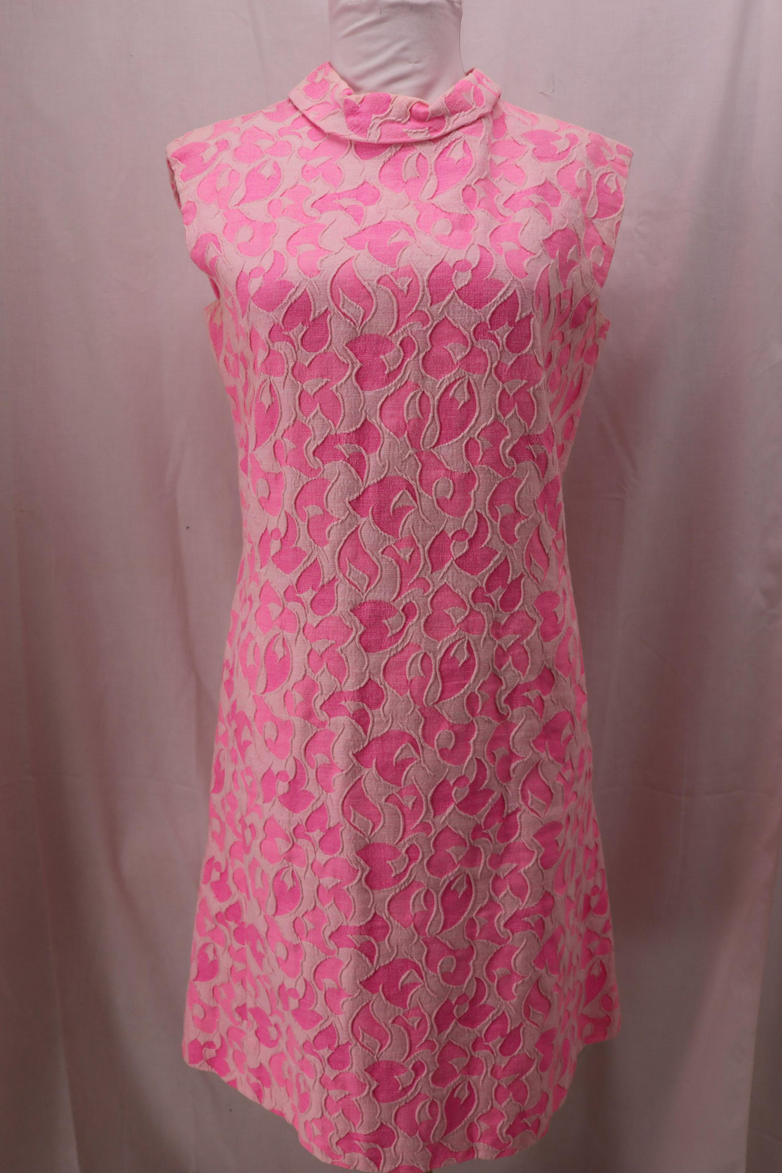 Vintage 1960's Pink Cotton Brocade Cocktail Dress: square cut sleeveless, rolled mock turtle neck, lower front pockets, back zipper, approx. 36 bust, 32 waist