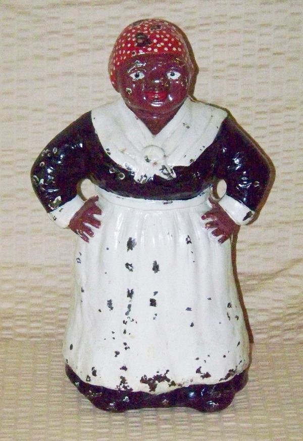 Black Americana Cast Iron "Black Mammy": Black Americana, Cast Iron "Black Mammy" door stop measures 12" H x 6" W