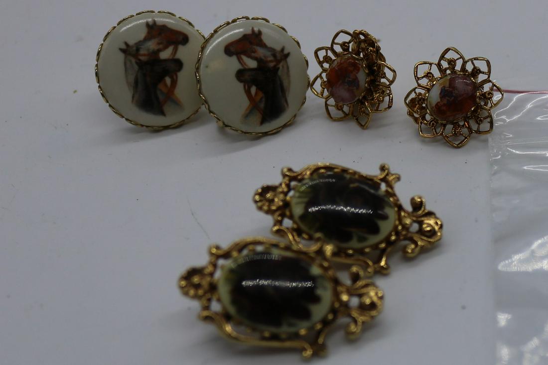A lot of three pairs of vintage earrings.  One is (1 of 4)