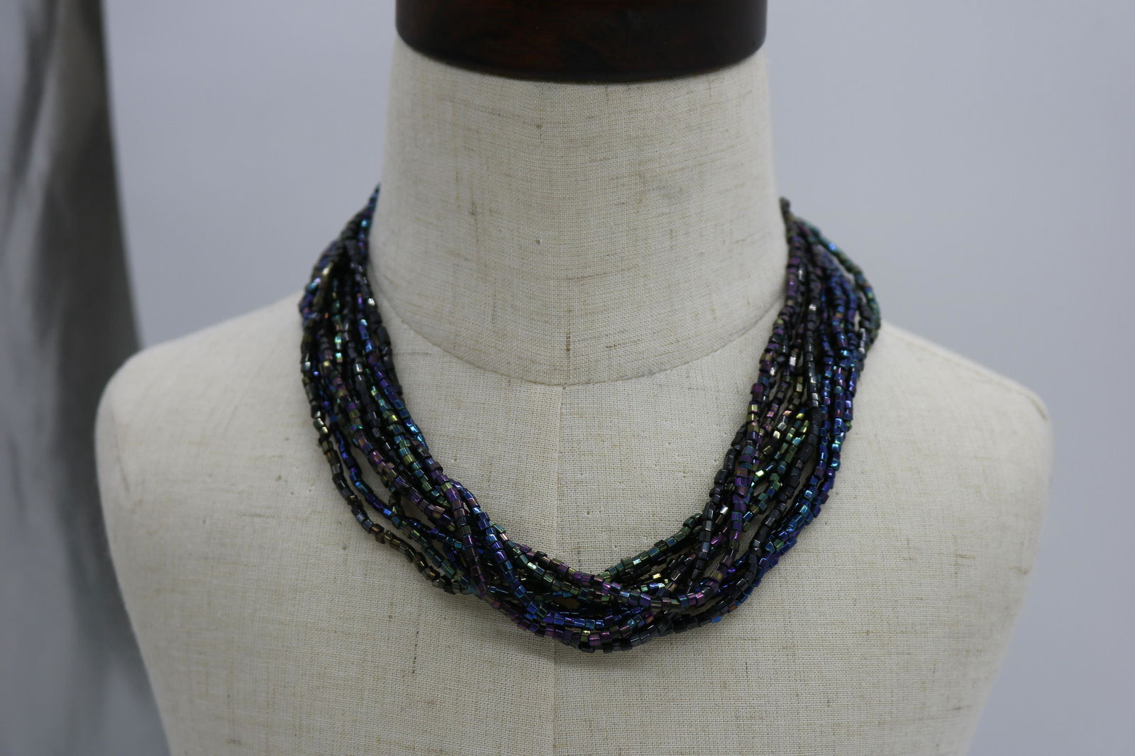 A vintage multi strand black iridescent bead necklace. (1 of 2)