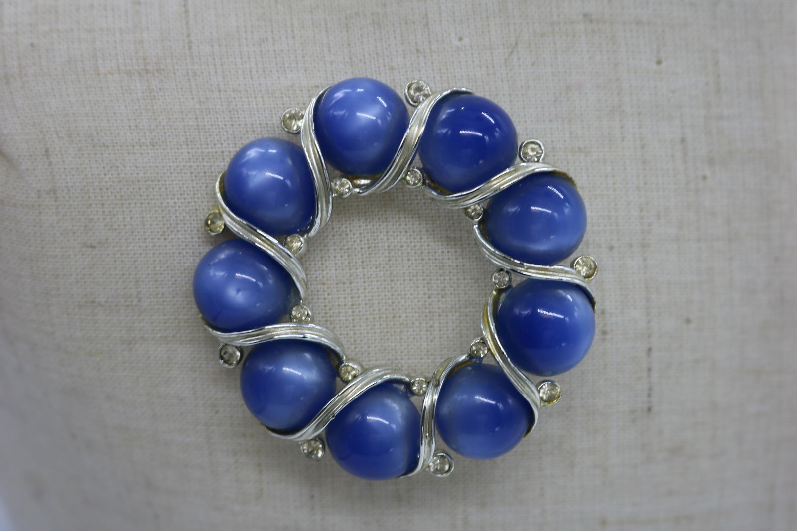 A signed Lisner vintage circle pin with blue moonglow (1 of 2)