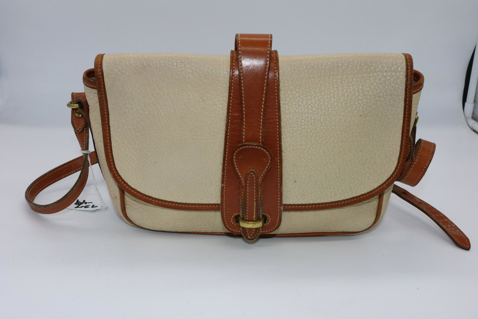 Vintage Dooney and Bourke Shoulder Bag: white and brown leather, logo on back, see photos.