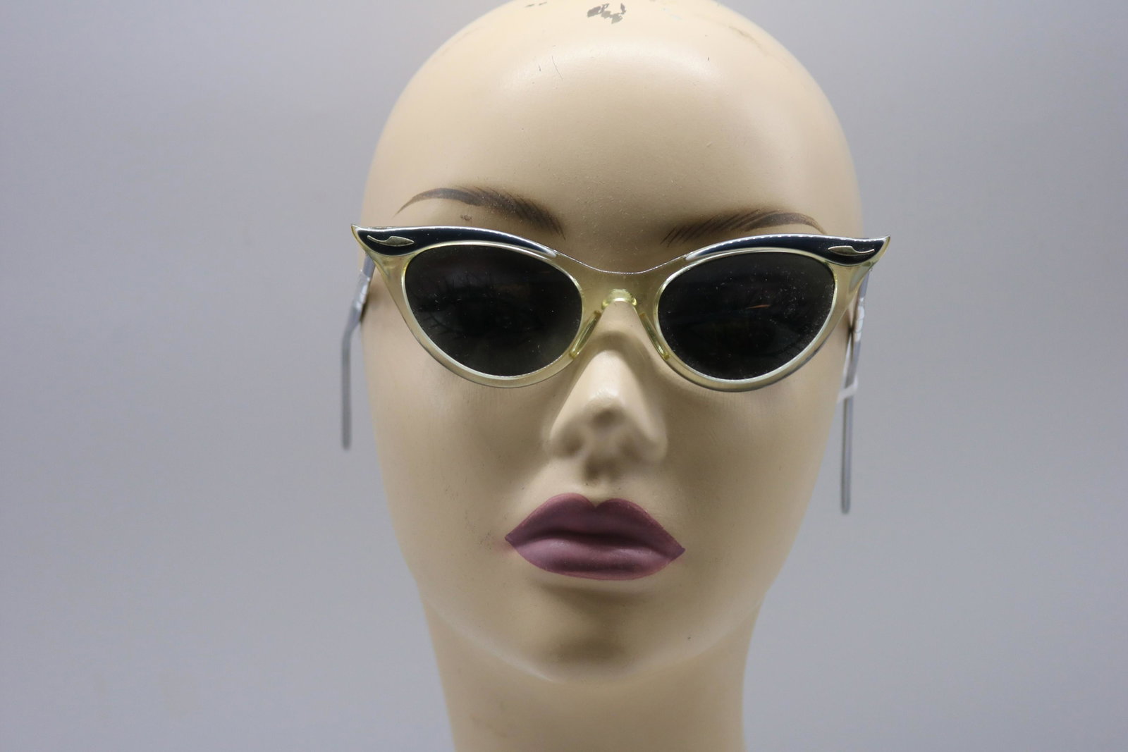 Vintage 1950's Ladies Kono Cat Eye Sunglasses: Plastic and metal with rhinestones, marked Kono USA 5 3/4, Approx. 5.5 inches across, good condition.