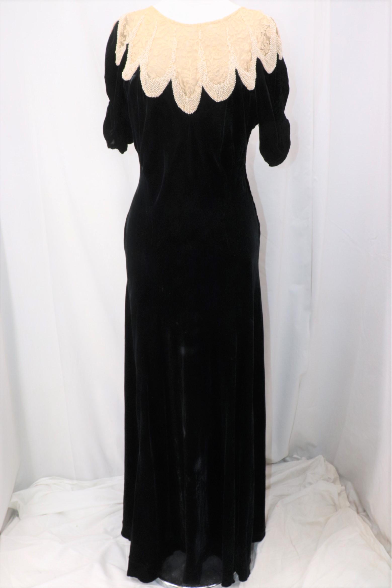 Vintage 1930's Black Velvet & Lace Gown: smocked short sleeves, round neck, scalloped sheer lace yoke with pearl-like beading, black velvet body and skirt, full length skirt, side metal zipper, Approx. 36" Bust, 32" Waist, seam repair needed
