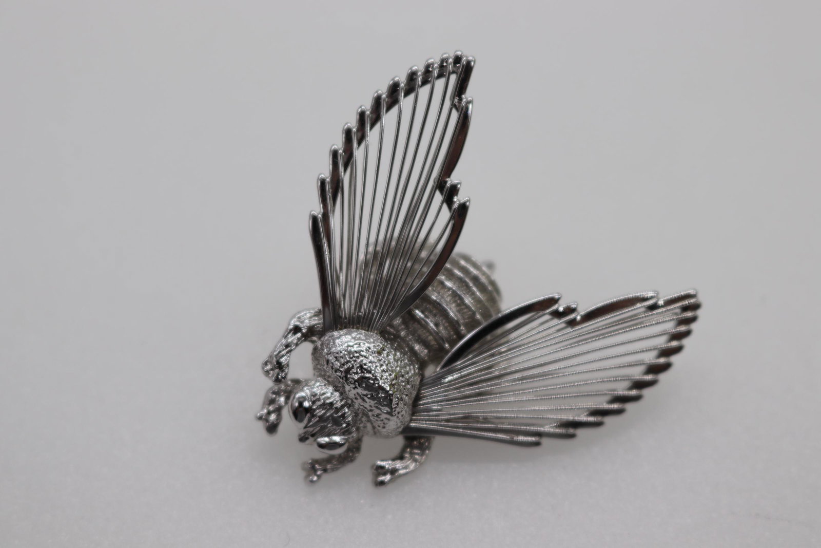 Vintage Signed Monet Silver-Tone Bee Brooch: Monet silver tone bee brooch, Filigree wings, Approx. 1.5", see photos.