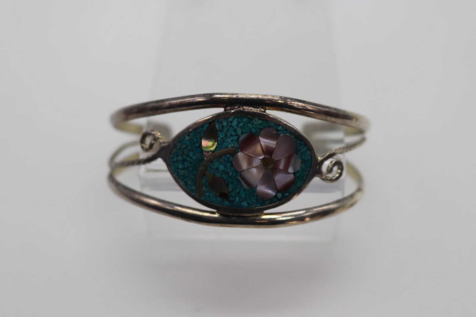 Vintage Silver-Tone Clutch Bracelet With Flower Design: Made in Mexico, flower design with Turquoise colored stone, Abalone, & Mother of Pearl, Approx. 5", see photos.