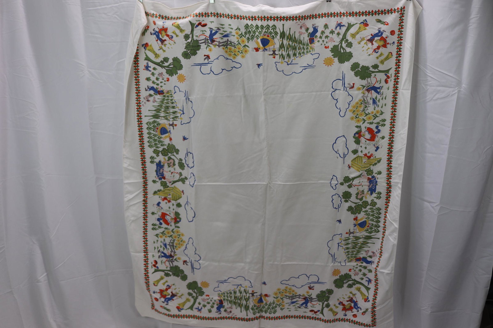Vintage 1940's/50's Farmer Print Tablecloth: approx. 48x56, see photos for stains.