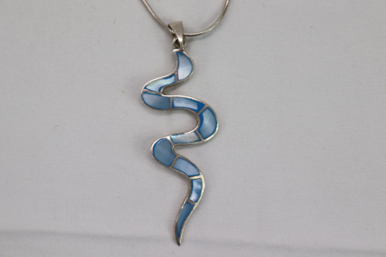 Vintage Sterling Necklace & Pendant: inlay snake like pendant, approx. 2 inch pendant & 15 inch chain